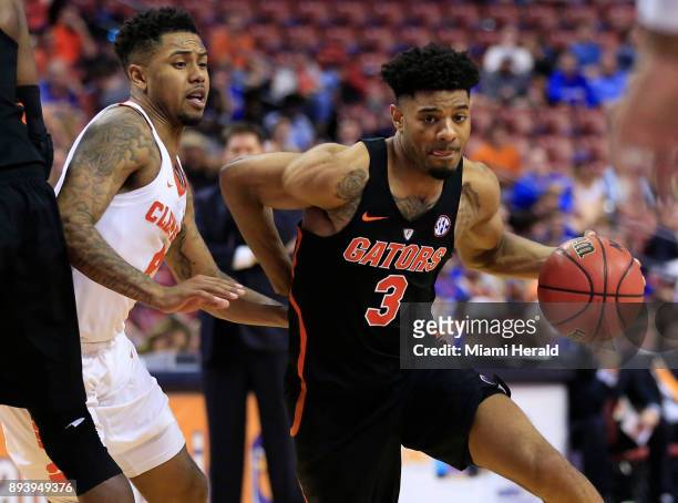 Florida's Jalen Hudson drives the ball against Clemson during the Orange Bowl Basketball Classic at the BB&T Center in Sunrise, Fla., on Saturday,...