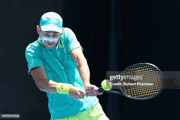 Alex De Minaur of Australia competes in his match against Alex Bolt of Australia during the Australian Open December Showdown at Melbourne Park on...