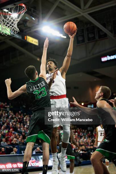 Johnathan Williams of the Gonzaga Bulldogs goes to the basket against Kienan Walter of the North Dakota Fighting Hawks in the first half at McCarthey...