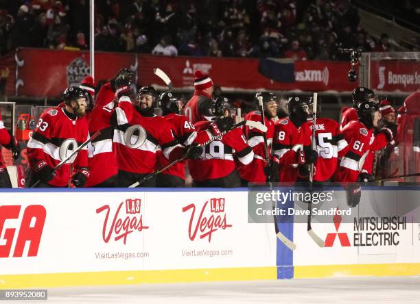 The Ottawa Senators celebrate after a second period goal by Jean-Gabriel Pageau during the 2017 Scotiabank NHL100 Classic at Lansdowne Park on...