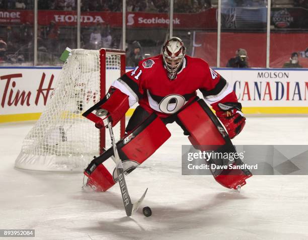 Craig Anderson of the Ottawa Senators controls a bouncing puck in a game against the Montreal Canadiens during the 2017 Scotiabank NHL100 Classic at...