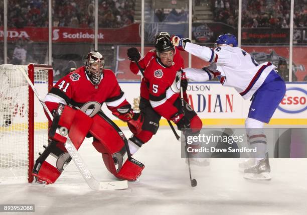 Jeff Petry of the Montreal Canadiens battles for position with Cody Ceci of the Ottawa Senators in front of teammate Craig Anderson during the 2017...