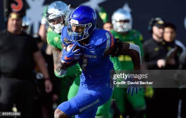 Cedrick Wilson of the Boise State Broncos runs wit the ball against the Oregon Ducks in the the Las Vegas Bowl at Sam Boyd Stadium on December 16,...