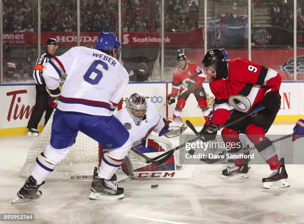 Bobby Ryan of the Ottawa Senators battles for a loose puck with Shea Weber and Carey Price of the Montreal Canadiens during the 2017 Scotiabank...