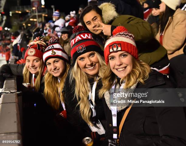 Fans cheer as the Ottawa Senators take on the Montreal Canadiens during the 2017 Scotiabank NHL100 Classic at Lansdowne Park on December 16, 2017 in...