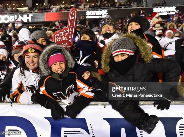 Fans cheer as the Ottawa Senators take on the Montreal Canadiens during the 2017 Scotiabank NHL100 Classic at Lansdowne Park on December 16, 2017 in...