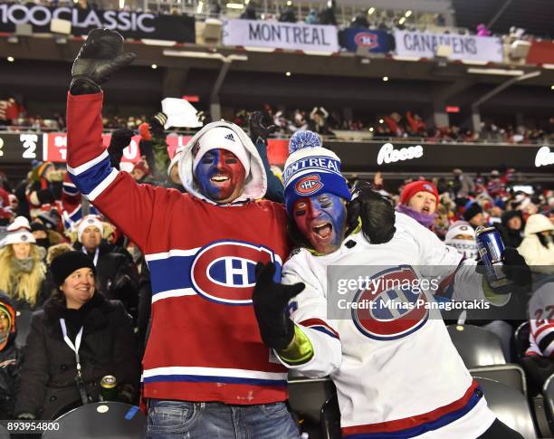 Fans cheer as the Ottawa Senators take on the Montreal Canadiens during the 2017 Scotiabank NHL100 Classic at Lansdowne Park on December 16, 2017 in...