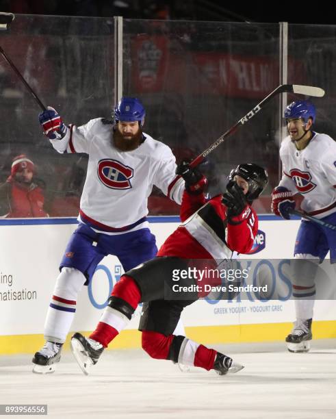 Jordie Benn of the Montreal Canadiens collides with Matt Duchene of the Ottawa Senators during the 2017 Scotiabank NHL100 Classic at Lansdowne Park...
