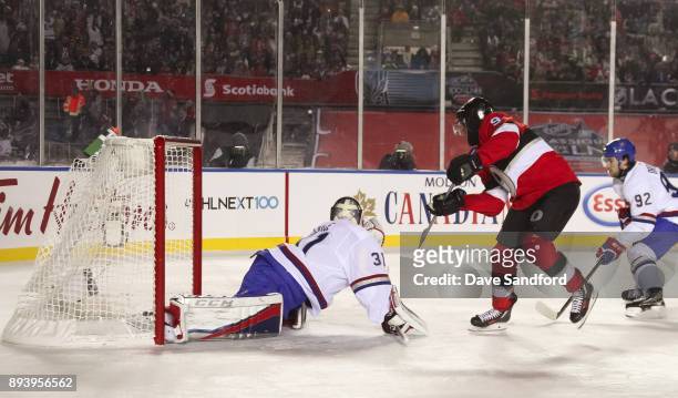 Bobby Ryan of the Ottawa Senators gets the puck past Carey Price of the Montreal Canadiens to score a third period goal during the 2017 Scotiabank...