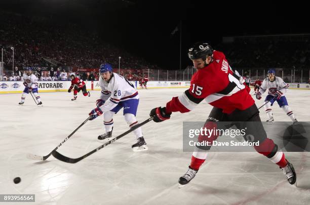 Zack Smith of the Ottawa Senators gets a shot off with pressure from Jakub Jerabek of the Montreal Canadiens during the 2017 Scotiabank NHL100...