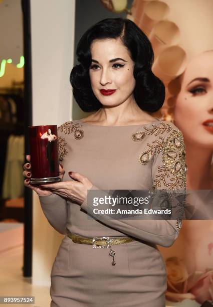 Burlesque dancer Dita Von Teese and luxury fragrance brand Heretic Parfum launch their candle and fragrance collaboration Scandalwood at Maxfield on...