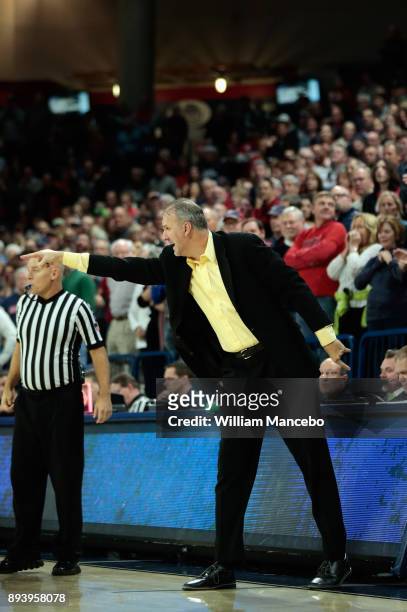 Head coach Brian Jones of the North Dakota Fighting Hawks directs his players from the sideline against the Gonzaga Bulldogs in the second half at...