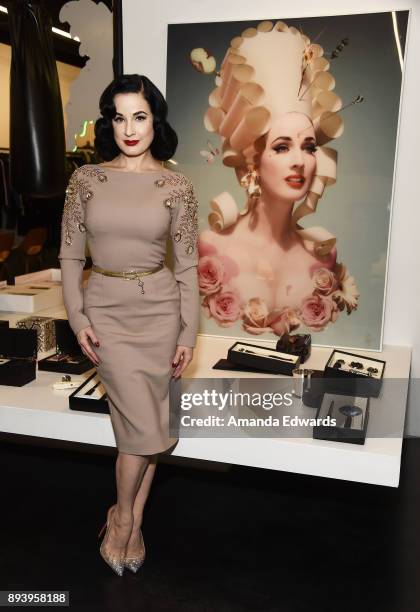 Burlesque dancer Dita Von Teese and luxury fragrance brand Heretic Parfum launch their candle and fragrance collaboration Scandalwood at Maxfield on...