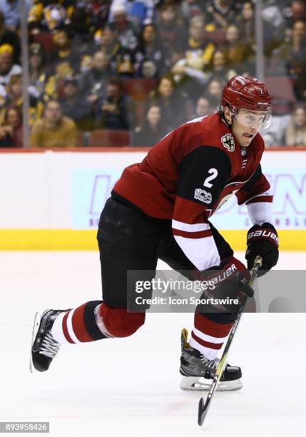 Arizona Coyotes defenseman Luke Schenn retrieves the puck during the NHL hockey game between the Pittsburgh Penguins and the Arizona Coyotes on...