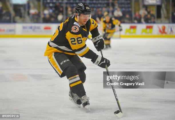 Christian Thomas of the Wilkes-Barre/Scranton Penguins brings the puck up ice during a game against the Bridgeport Sound Tigers at the Webster Bank...