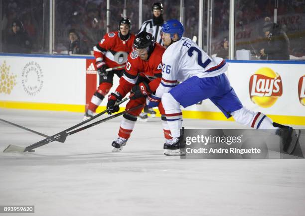 Gabriel Dumont of the Ottawa Senators skates with the puck against Jeff Petry of the Montreal Canadiens during the third period of the 2017...