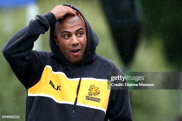 Jeetan Patel of Wellington looks on as rain delays play during the Twenty20 Supersmash match between Otago and Wellington on December 17, 2017 in...