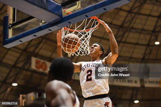 Zhaire Smith of the Texas Tech Red Raiders dunks the basketball during the game against the Rice Owls on December 16, 2017 at Lubbock Municipal...