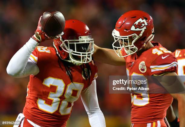 Free safety Ron Parker of the Kansas City Chiefs is congratulated by strong safety Daniel Sorensen after an interception during the game against the...