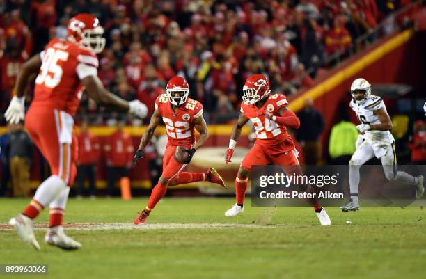 Cornerback Marcus Peters of the Kansas City Chiefs intercepts a pass during the game against the Los Angeles Chargers at Arrowhead Stadium on...