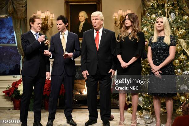 Episode 1734 -- Pictured: Alex Moffat as Eric Trump, Mikey Day as Donald Trump Jr., Alec Baldwin as President Donald J. Trump, Cecily Strong as First...
