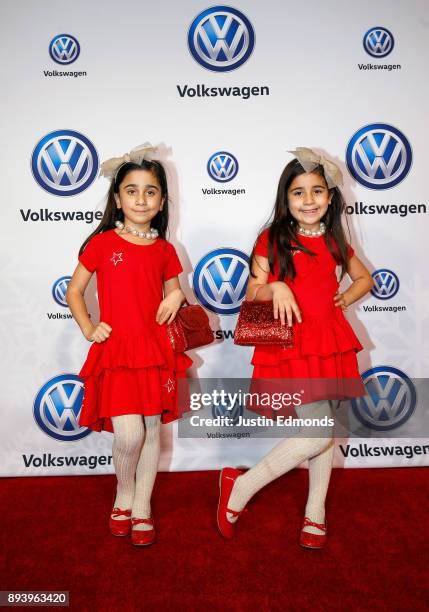 Bella Abir and Chloe Abir attend the Volkswagen Holiday Drive-In Event at Releigh Studios in Los Angeles, California on December 16, 2017.