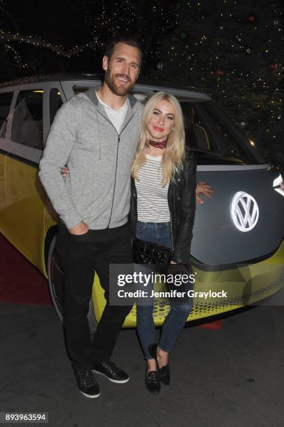 Brooks Laich and Julianne Hough attend the Volkswagen Holiday Drive-In Event at Releigh Studios in Los Angeles, California on December 16, 2017.