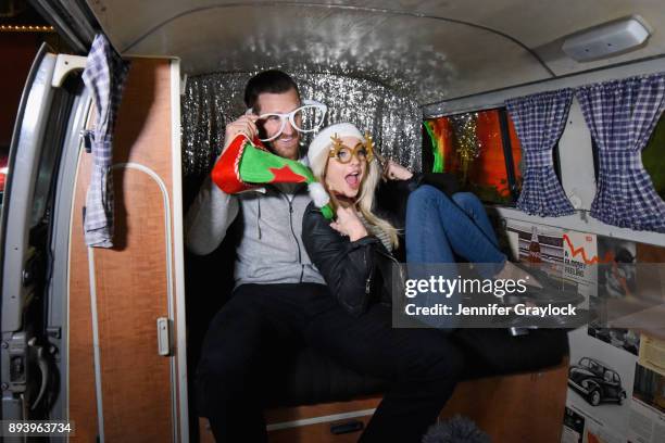 Brooks Laich and Julianne Hough attend the Volkswagen Holiday Drive-In Event at Releigh Studios in Los Angeles, California on December 16, 2017.