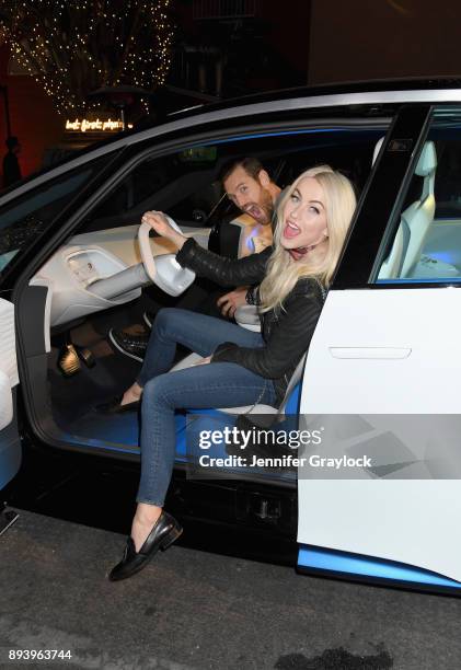 Brooks Laich and Julianne Hough attend the Volkswagen Holiday Drive-In Event at Releigh Studios in Los Angeles, California on December 16, 2017.