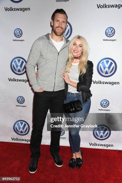 Brooks Laich and Julianne Hough attend the Volkswagen Holiday Drive-In Event at Releigh Studios in Los Angeles, California on December 16, 2017.