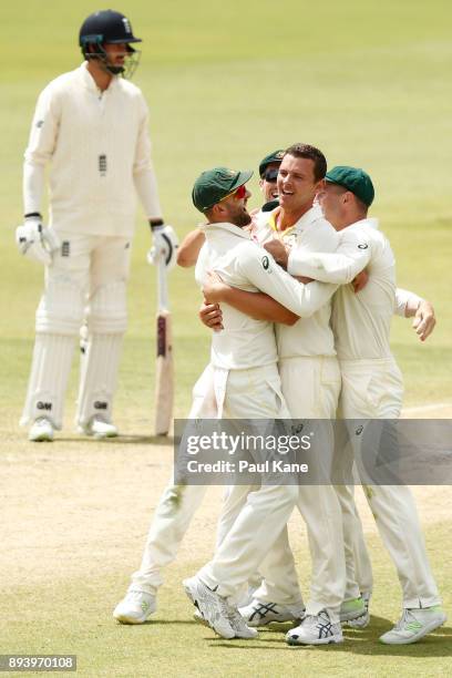 Josh Hazlewood of Australia celebrates after taking a catch off his bowling to dismiss Alistair Cook of England during day four of the Third Test...