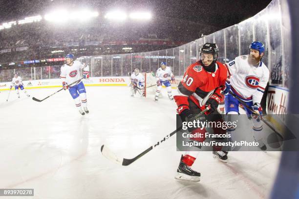 Gabriel Dumont of the Ottawa Senators skates against Jordie Benn of the Montreal Canadiens at the 2017 Scotiabank NHL 100 Classic at Lansdowne Park...