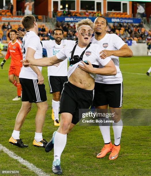 Jake Paul celebrates his goal with Charlie Davies during the Kick In For Houston Charity Soccer Match at BBVA Compass Stadium on December 16, 2017 in...