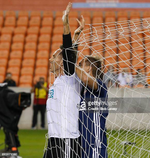 Steve Nash celebrates with Stuart Holden after scoring on header in the firt half during the Kick In For Houston Charity Soccer Match at BBVA Compass...
