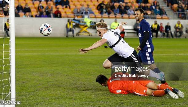 Jake Paul scores as he dives over the goalkeeper during the Kick In For Houston Charity Soccer Match at BBVA Compass Stadium on December 16, 2017 in...