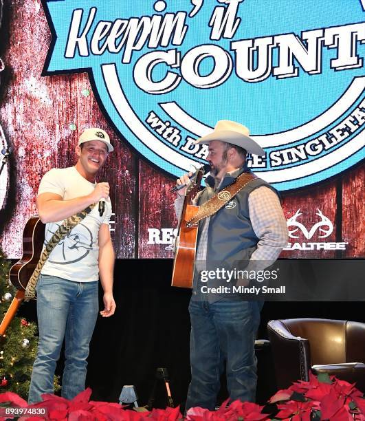 Recording artist Easton Corbin and Daryle Singletary perform during the "Keepin' it Country with Daryle Singletary" show during the National Finals...