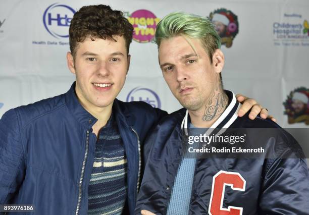 Actor Nolan Gould and singer Aaron Carter attend "The Night Time Show" Holiday Special benefiting Children's Hospital Los Angeles hosted by Stephen...