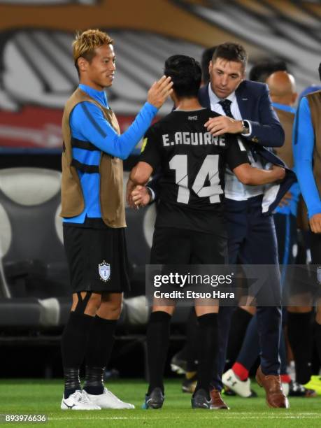 Pachuca head coach Diego Alonso and Keisuke Honda of Pachuca celebrate thier side's 4-1 victory after the FIFA Club World Cup UAE 2017 third place...