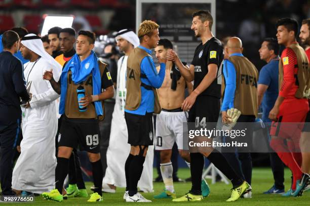 Players of Pachuca celebrate thier side's 4-1 victory after the FIFA Club World Cup UAE 2017 third place play off match between Al Jazira and CF...