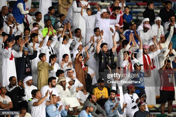 Fans of Al Jazira cheer during the FIFA Club World Cup UAE 2017 third place play off match between Al Jazira and CF Pachuca at the Zayed Sports City...