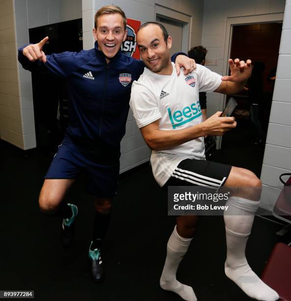 Stuart Holden and Landon Donovan mix it up in the lockerroom during the Kick In For Houston Charity Soccer Match at BBVA Compass Stadium on December...