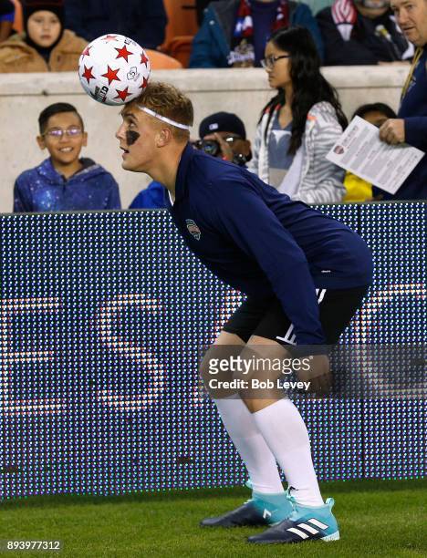 Jake Paul working on his heading skills during the Kick In For Houston Charity Soccer Match at BBVA Compass Stadium on December 16, 2017 in Houston,...