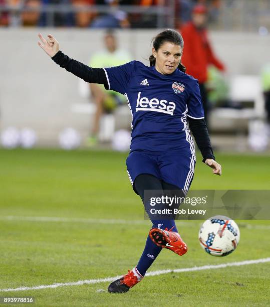 Mia Hamm shoots on goal during the Kick In For Houston Charity Soccer Match at BBVA Compass Stadium on December 16, 2017 in Houston, Texas.