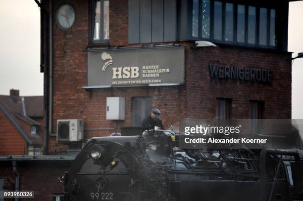 Steam powered locomotive of the Harz Narrow Gauge Railways prepares to leave the station on December 16, 2017 in Wernigerode, Germany. Harz Narrow...