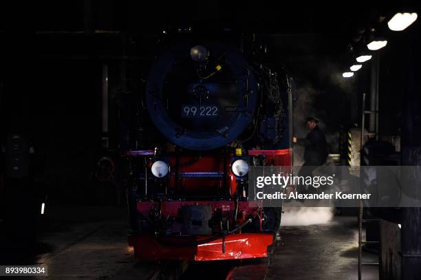 Steam powered locomotive of the Harz Narrow Gauge Railways prepares to leave the station on December 16, 2017 in Wernigerode, Germany. Harz Narrow...