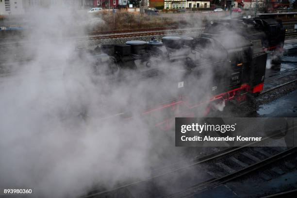 Steam powered locomotive of the Harz Narrow Gauge Railways prepares to leave the station on December 16, 2017 in Wernigerode, Germany. Harz Narrow...