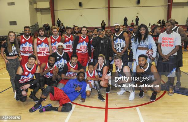 Lil Dicky, Miles Brown, Ice Cube, Baron Davis, and Karen Civil pose for portrait at Baron Davis hosts Black Santa Celebrity Basketball Fundraiser on...