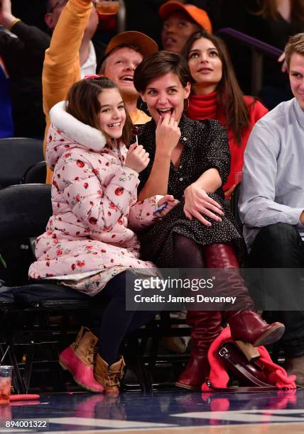 Suri Cruise and Katie Holmes attend the Oklahoma City Thunder Vs New York Knicks game at Madison Square Garden on December 16, 2017 in New York City.