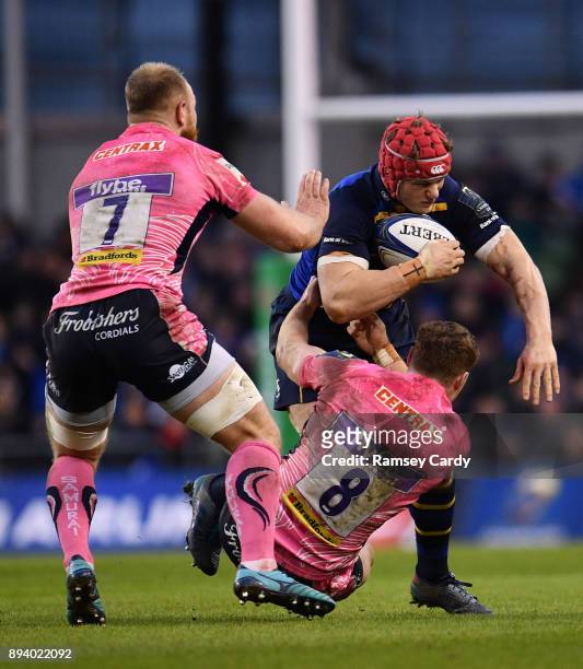 Dublin , Ireland - 16 December 2017; Josh van der Flier of Leinster is tackled by Sam Simmonds of Exeter Chiefs during the European Rugby Champions...