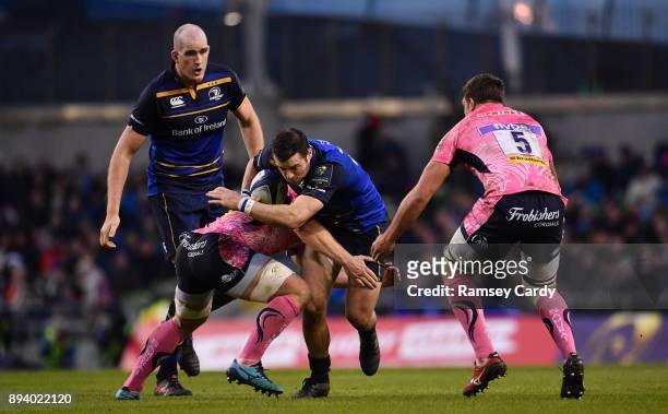 Dublin , Ireland - 16 December 2017; Robbie Henshaw of Leinster is tackled by Mitch Lees of Exeter Chiefs during the European Rugby Champions Cup...